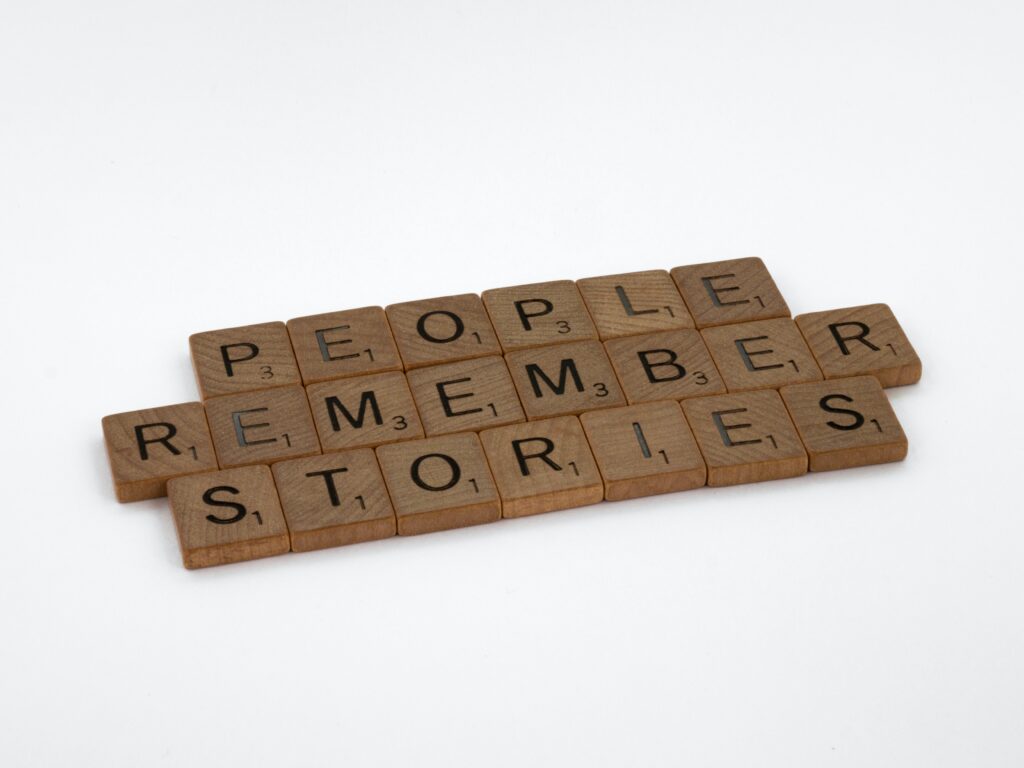 Photo of Scrabble tiles spelling out People Like Stories