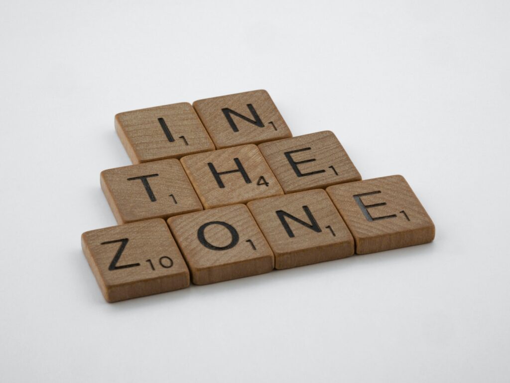 Wooden tiles spelling out In The Zone